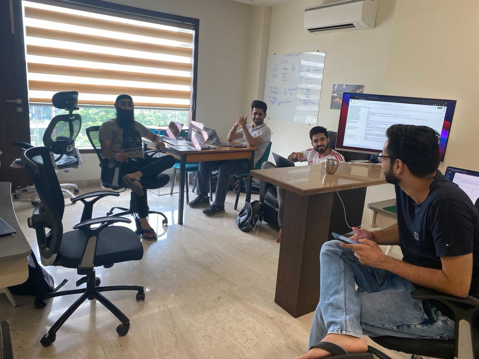 Sahil with team in office